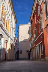 Low Angle View of Pula Street. Beautiful Colorful Buildings in Morning Sunny Croatia.
