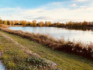 Lake view. Near Lake Buzerens, Bram, France. Reflections of the natural landscape in the water.