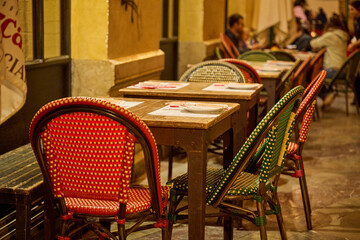Fototapeta na wymiar Tables on a restaurant terrace in Malaga, Spain