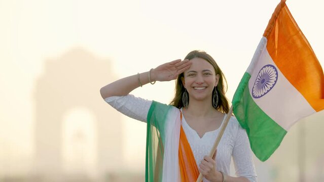 Indian girl saluting with Indian flag
