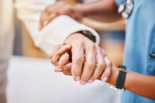 Nurse, hands and helping patient with walking, rehabilitation and elderly care in clinic. Closeup caregiver, nursing home and support of holding hands for healthcare safety, medical service and trust
