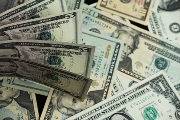 Banknotes of 5 US dollars, Stacks of money from a banknote of 5 dollars, top view.
five dollar bill Abraham Lincoln