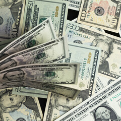 Banknotes of 5 US dollars, Stacks of money from a banknote of 5 dollars, top view.
five dollar bill...