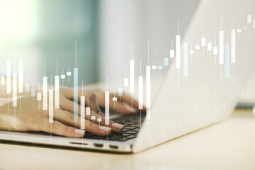 Multi exposure of abstract creative financial chart with hand typing on computer keyboard on background, research and analytics concept