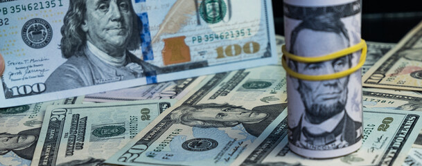 Banknotes of 5 US dollars, Stacks of money from a banknote of 5 dollars, top view.
five dollar bill...