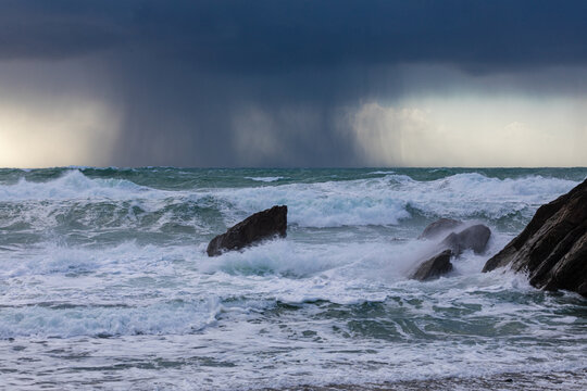 Stormy Waves Crashing onto Cornish Rocks