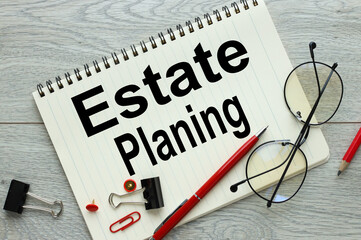 estate planning text on paper, business concept image with soft focus background