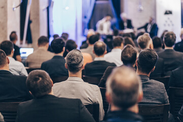Fototapeta premium Round table discussion at business convention and Presentation. Audience at the conference hall. Business and entrepreneurship symposium.