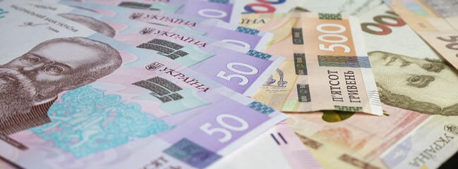 Mikhail Hrushevsky, Ukrainian politician and historian Portrait from Ukraine 50 hryvnia banknotes
Different Ukrainian paper money backgrounds. saving finance concept