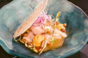 Traditional Peruvian dish garnished in a restaurant