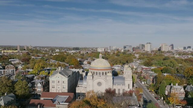 Aerial footage slowly rotating towards the St. Francis De Sales Catholic Church in west Philadelphia, Pennsylvania.