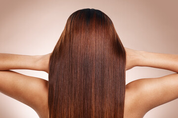 Hair, beauty and back of woman in studio for hair care, hair products and cosmetics on beige...