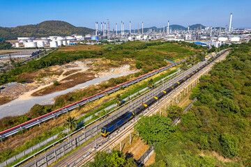 Oil transport train parked in oil pumping depot.