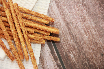 Long dry baked bread sesame sticks.