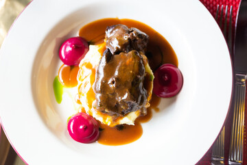 beef cheek with mashed potatoes and currant oil