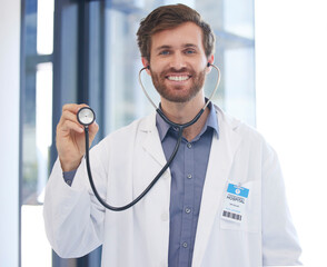 Cardiology doctor and portrait of man at hospital with expert stethoscope for medical evaluation. Healthcare, cardiologist and professional worker with equipment for heart health consulting.