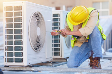 Air conditioning, technician or engineer on roof for maintenance, building or construction of fan hvac repair. Air conditioner, handyman or worker with tools working on a city development project job - obrazy, fototapety, plakaty