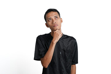 Asian man wearing black training t-shirt, Gesture thinking or getting idea. Isolated by white background