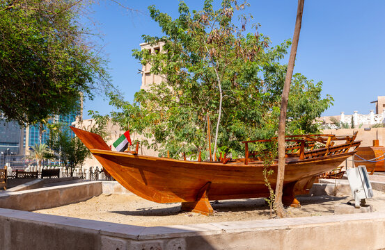 Traditional wooden rowing boat - abra - displayed in Al Fahidi Historical District, Dubai, United Arab Emirates.