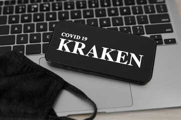 The new COVID 19 KRAKEN virus. The name KRAKEN on the smartphone screen. New screensaver on the...