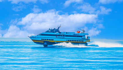 hydrofoil boat runs at full speed on the sea waves