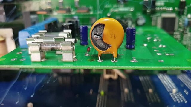The explosion of the varistor on the electronic board.