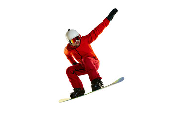 Portrait of active man, snowboarder in uniform riding on snowboard isolated over white studio...