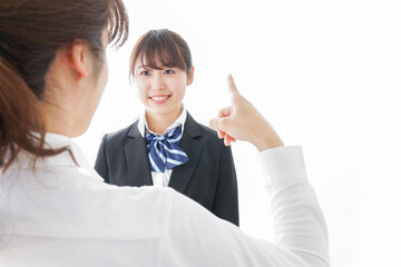 先生に怒られる生徒