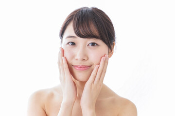 Fototapeta premium スキンケアをする若い女性