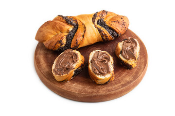 Homemade sweet bun with chocolate cream isolated on white. side view.