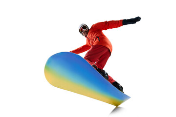 Bottom view. Portrait of active man, snowboarder in uniform riding on snowboard isolated over white studio background. Concept of winter sport, action, motion