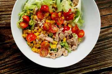 Fresh mixed salad with cabbage and cherry tomatoes