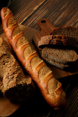 Variety of breads on wooden board