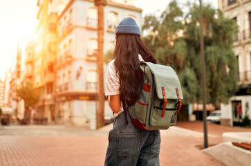 Asian female tourist student on city streets