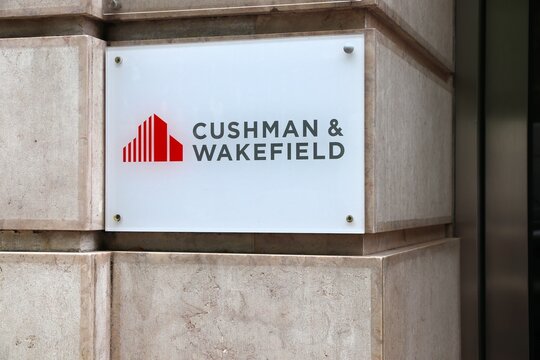 LISBON, PORTUGAL - JUNE 6, 2018: Cushman and Wakefield office sign in Lisbon, Portugal. Cushman and Wakefield is a global commercial real estate services firm.