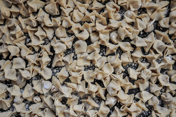 Homemade Turkish manti. (Traditional Turkish ravioli) Ready to cook handmade manti, dumplings