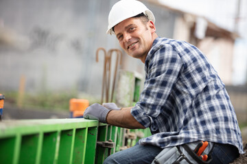 construction builder working on foundations