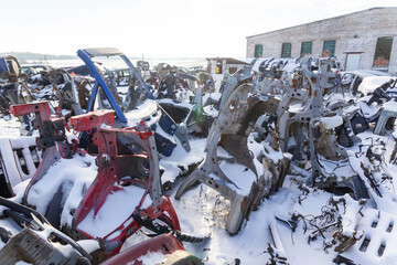 Disassembled cars on a car dump are on sale for spare parts.