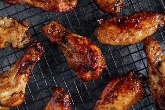 Roasted chicken wings on grill