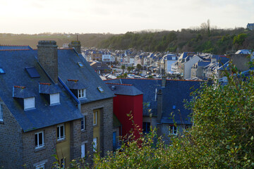 Fototapeta premium View of the town of Cancale, located on the coast of the Atlantic Ocean on the Baie du Mont Saint Michel, in the Cotes d'Armor, Brittany region of Western France.