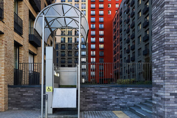 Wheelchair lift for people with physical disabilities near modern building