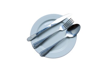 , spoon, and kForknife silverware in empty white plate isolated on white background closeup.
