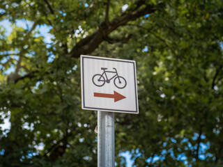 Bicycle tourist trail. Marking the tourist trail. The sign is painted on a metal plate. Bicycle path, route marking for people who travel by bicycle.