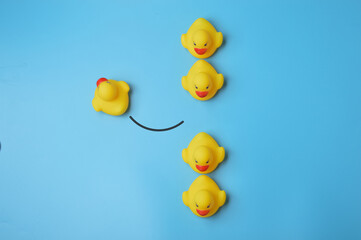 Toy duck walking to different way. individuality and different creative idea concept