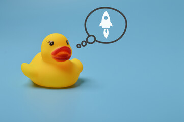 Toy duck and rocket symbol. Start up and business target achievement concept.