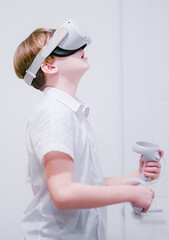 Young teenager wearing VR headset