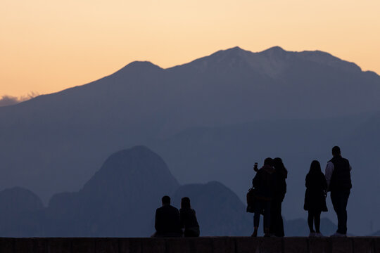 people taking pictures at sunset selfie silhouette valentine's day