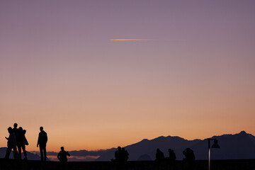 people taking pictures at sunset selfie silhouette valentine's day