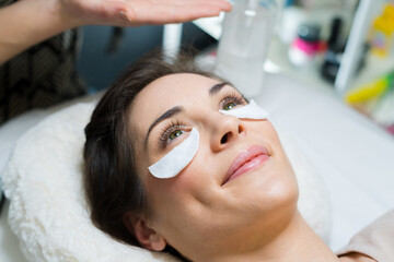 closeup of woman having facial beauty treatments