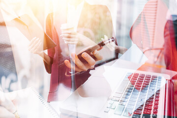 Businessman and team analyzing financial statement Finance task. with smart phone and laptop and tablet. Wealth management concept